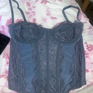 This top is from urban outfitters out from under Mordor. Love corset size small
